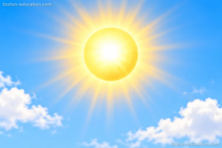 A bright sun in a blue sky with a few white clouds